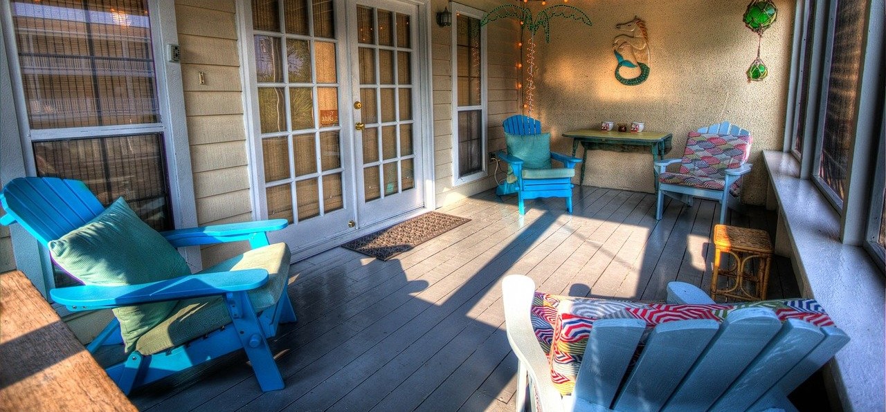 three chairs on a sunny veranda