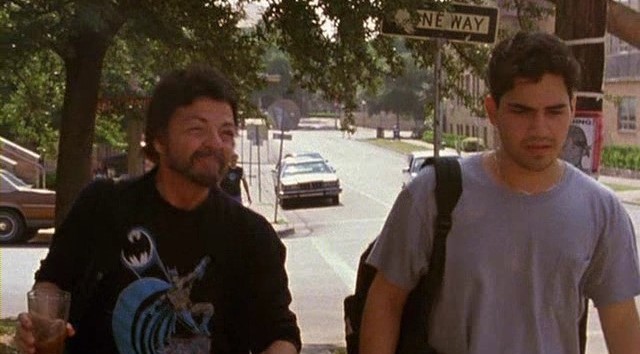 scene from Slacker movie, two men walking and talking