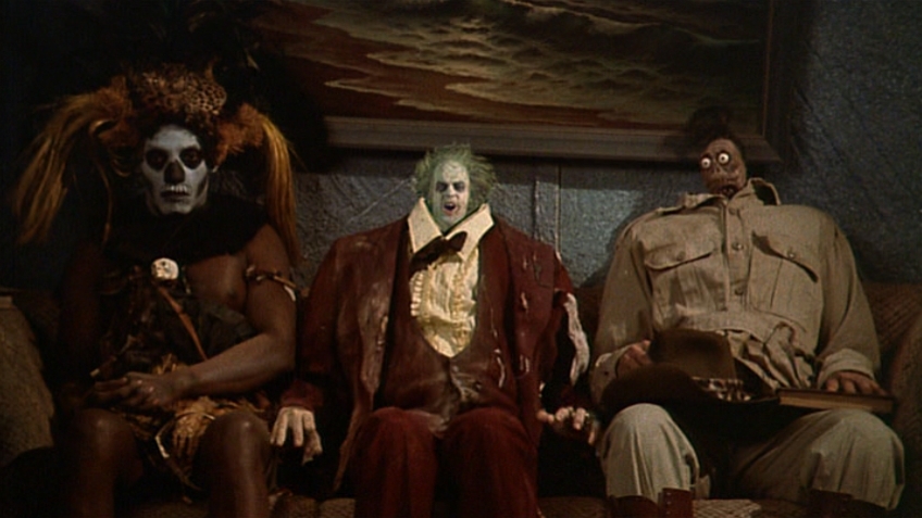 three ghosts in a waiting room, a scene from beetljuice